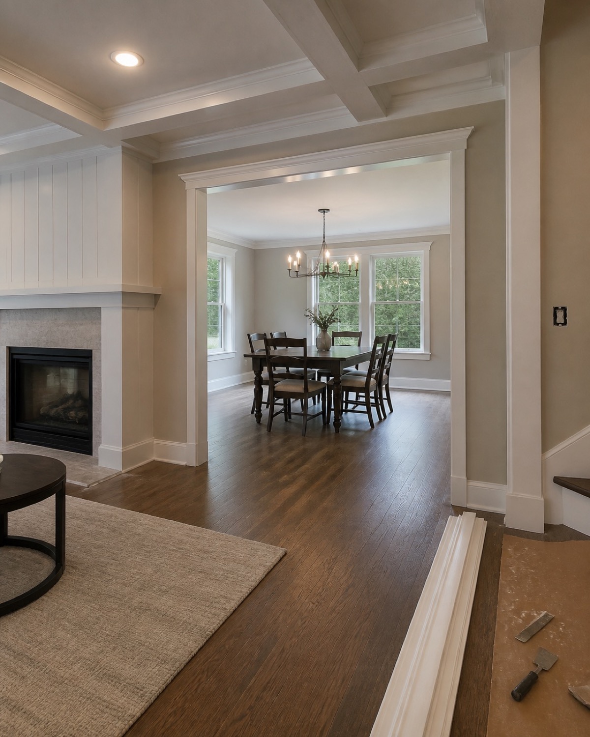 Interior remodeling details showing new flooring, trim, and doorway transitions